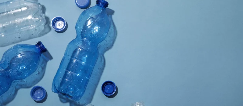 AnyConv.com__top-view-plastic-bottles-with-copy-space-scaled
